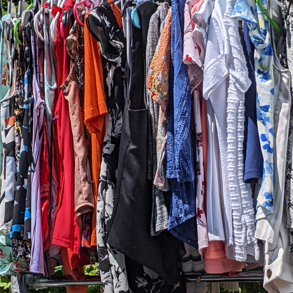 Full closet of shirts